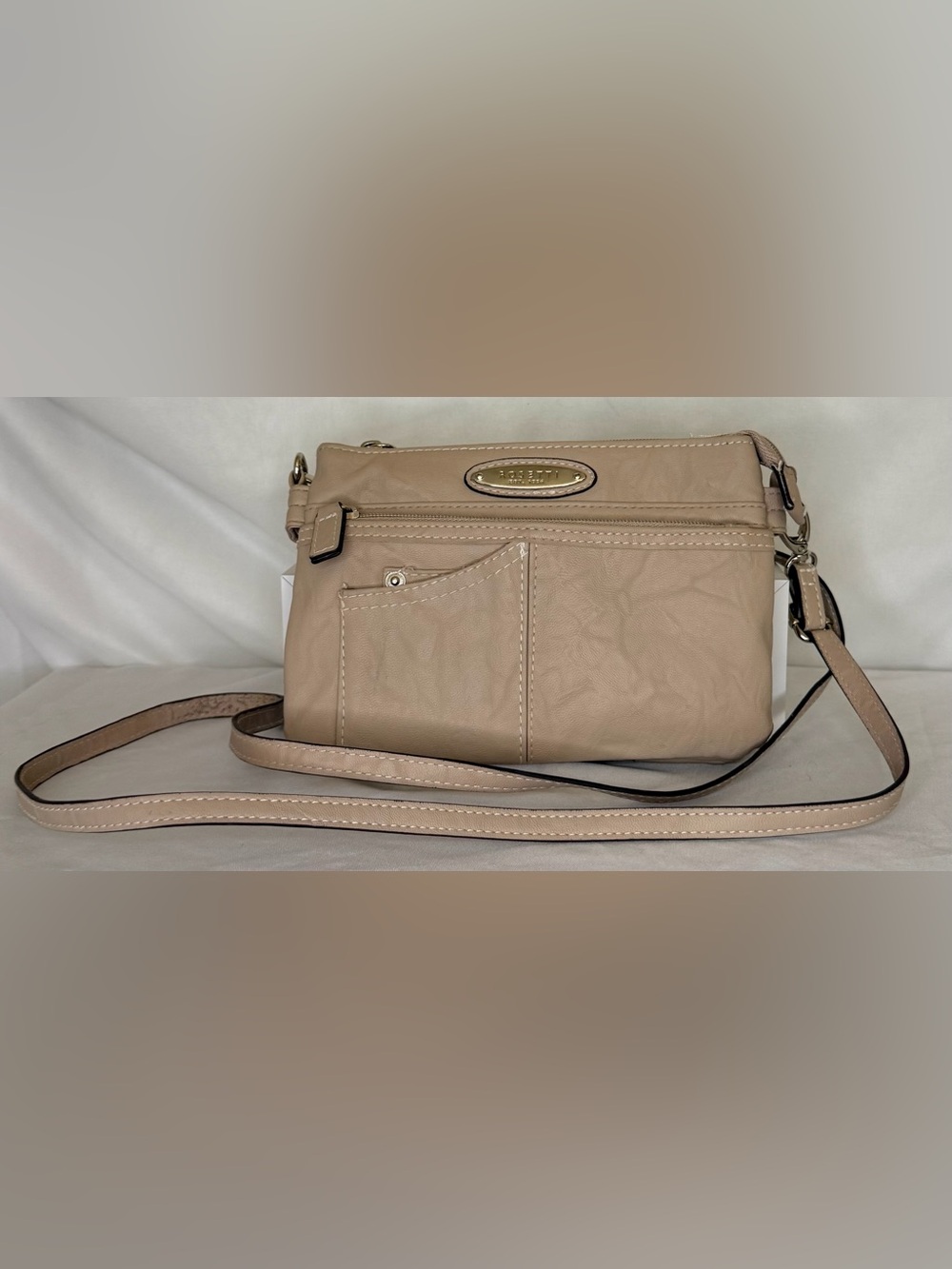 Rosetti Beige Crossbody with Front Zip Pocket and Gold Accent